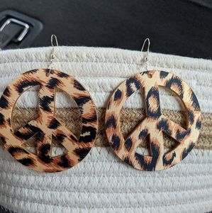 Peace earrings.